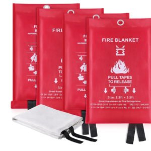 Four red fire‑blanket pouches with pull tapes and a folded fibreglass blanket.