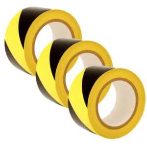 Three rolls of black‑and‑yellow striped hazard tape.